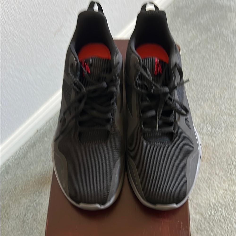 Black and Red Athletic Shoes with Breathable Mesh and Supportive Design